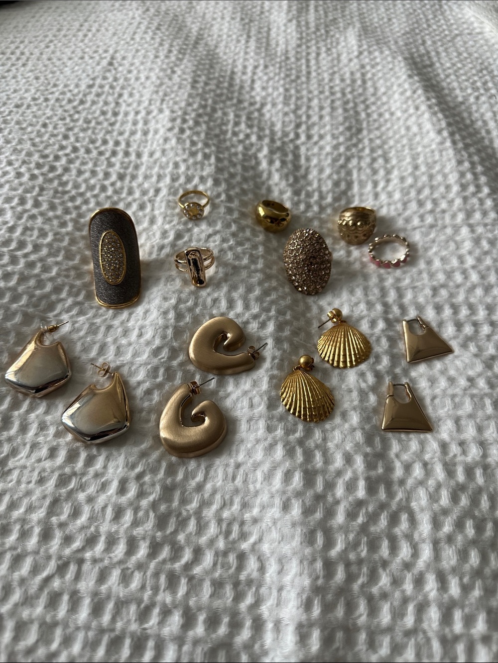 Bundle of earrings and rings